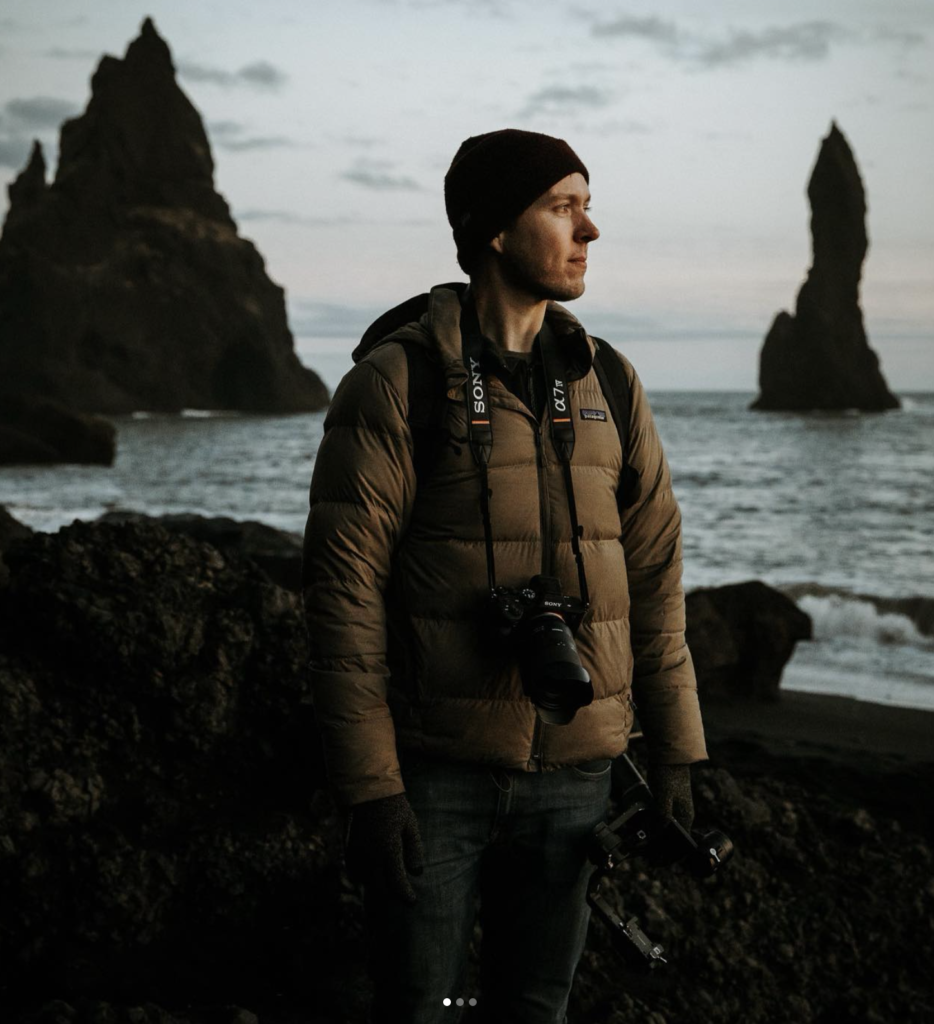 man in a winter jacket standing outdoors